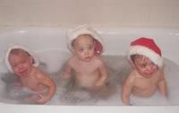 Triplets playin' santa