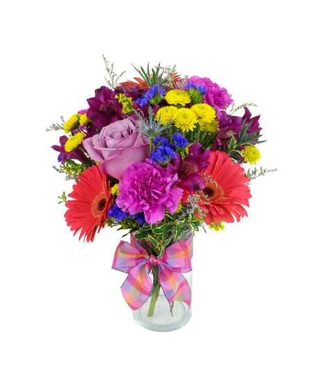 Bright and colorful flowers are arranged in a cylinder vase. 