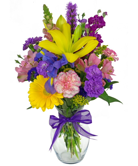 Reminiscent of a walk in a field of wildflowers, this bouquet is a beauty.