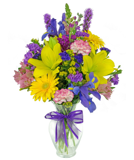 Reminiscent of a walk in a field of wildflowers, this bouquet is a beauty.