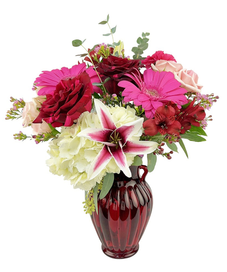Reds, pinks and whites in a red vase.