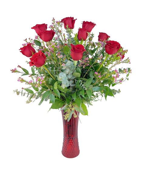 Gorgeous red roses in a red vase.