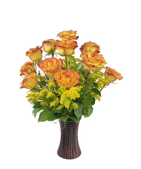 A tall, slender, red vase filled with bi-color yellow & red roses, that open beautifully.