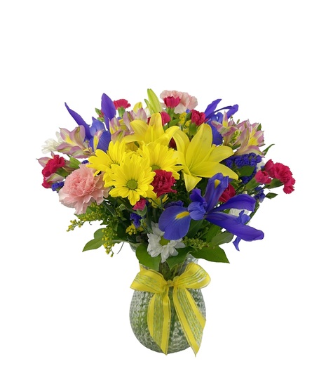 A large bouquet delicately arranged in a vase.