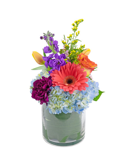 A lovely variety of flowers and colors to brighten the day of anyone who receives it. 