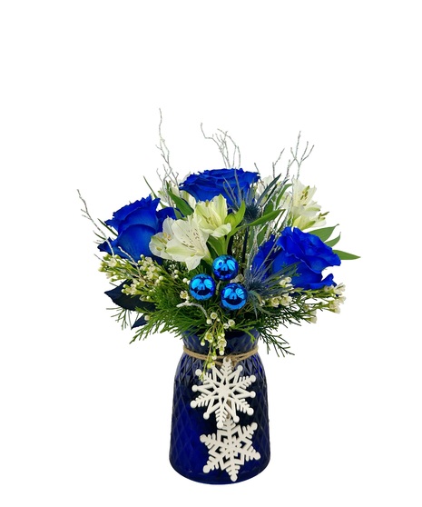 Blue vase, white flowers and pinecones make a not so blue Christmas piece