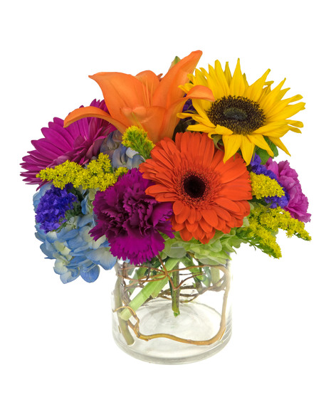 A truly gorgeous sunflower mix with so much color and texture, in a cylinder vase. 
