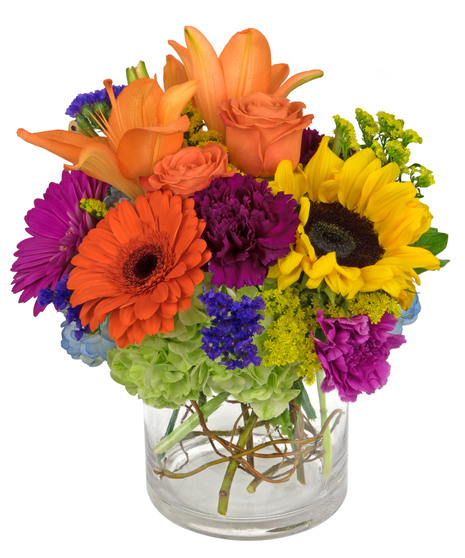 A truly gorgeous sunflower mix with so much color and texture, in a cylinder vase. 