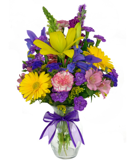 Reminiscent of a walk in a field of wildflowers, this bouquet is a beauty.
