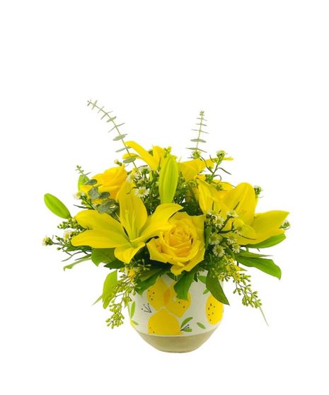 Yellow flowers in an adorable lemon container