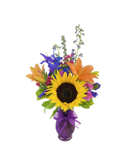 Pretty bouquet of orange, pinks and purples like a sunset.